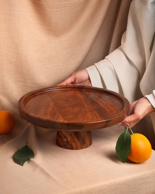 Handmade wooden cake stand for cakes and desserts, crafted from natural wood.
